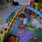 061029-RCBirtday14-COPlaysWithMirrorOnTummy